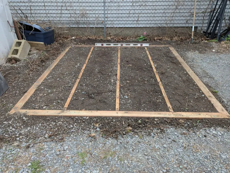 Resin shed floor frame leveled on gravel pad, Markham Ontario