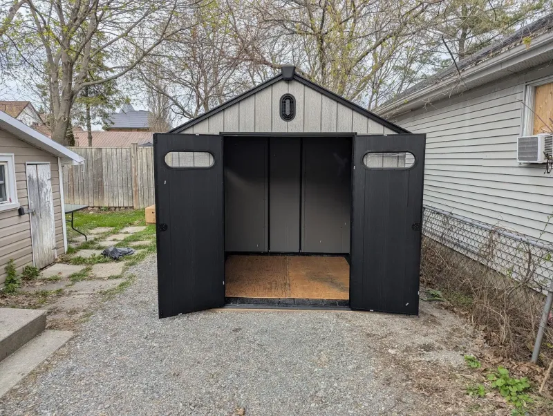 Resin shed installed with doors open, Markham Ontario