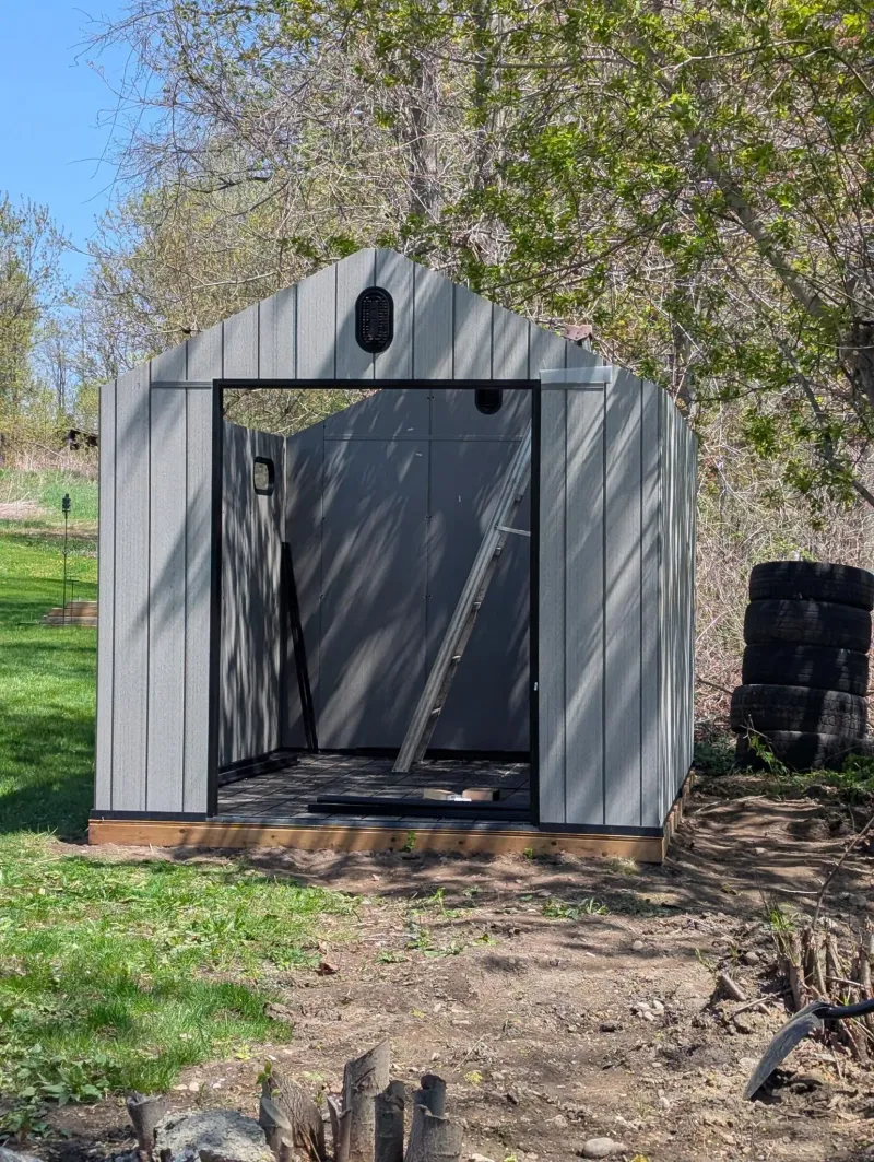 Resin shed fully installed with doors open, The Kawarthas Ontario