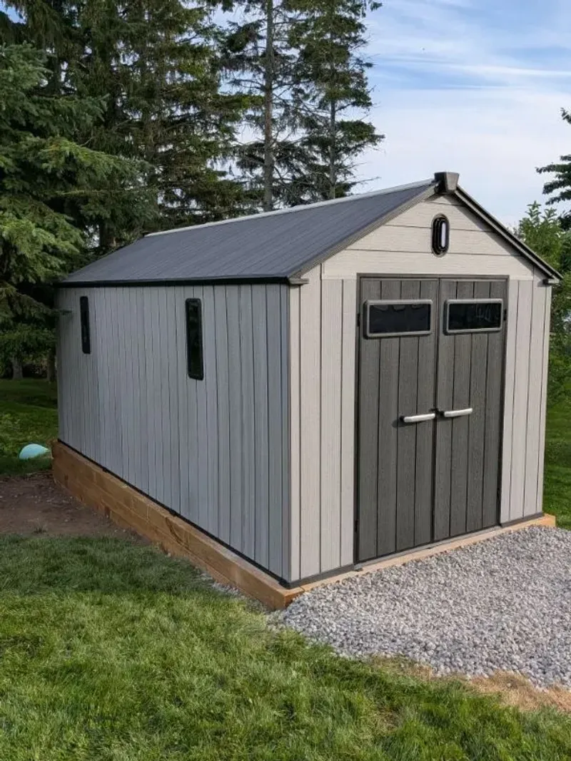 Resin shed side angle view on gravel pad, Wellington Ontario
